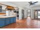 Open-concept living room with tile floors, stainless steel appliances and a view of the backyard at 7232 N 22 Nd St, Phoenix, AZ 85020