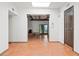 Light-filled living room with tile flooring, a fireplace, and an open layout at 7232 N 22 Nd St, Phoenix, AZ 85020
