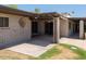 Back patio with exposed beams, ceiling fans and decorative brickwork at 7232 N 22 Nd St, Phoenix, AZ 85020