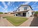 Spacious backyard features a putting green, ample patio space and privacy fence at 737 E Harwell Rd, Phoenix, AZ 85042