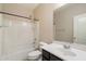Clean and tidy bathroom features a shower-tub combo, toilet, and vanity with mirror at 737 E Harwell Rd, Phoenix, AZ 85042