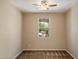 Simple, tidy bedroom with carpet and a window for natural light and ventilation at 737 E Harwell Rd, Phoenix, AZ 85042