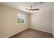 Simple, tidy bedroom with carpet and a window for natural light and ventilation at 737 E Harwell Rd, Phoenix, AZ 85042