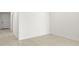 Empty bedroom with neutral paint and tile flooring at 7428 W Buckhorn Trl, Peoria, AZ 85383