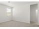 Neutral bedroom with carpet and window at 7428 W Buckhorn Trl, Peoria, AZ 85383