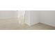 Empty living room with neutral paint and tile flooring at 7428 W Buckhorn Trl, Peoria, AZ 85383