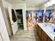 Bright bathroom featuring a double sink vanity and closet with plentiful storage at 7551 W Darrel Rd, Laveen, AZ 85339