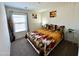 Inviting bedroom with window and horse-themed decor at 7551 W Darrel Rd, Laveen, AZ 85339