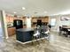 Inviting kitchen with a center island, wood cabinets, and wood-look flooring at 7551 W Darrel Rd, Laveen, AZ 85339