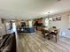 Open concept kitchen featuring a large island, wooden cabinets, and modern appliances at 7551 W Darrel Rd, Laveen, AZ 85339