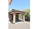 Covered patio area featuring a concrete base and access to the backyard at 7551 W Darrel Rd, Laveen, AZ 85339