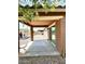 Covered patio area featuring a concrete base and access to the backyard at 7551 W Darrel Rd, Laveen, AZ 85339