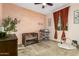 Cozy Bedroom features cute wildlife wall decor and includes a crib, changing table and playing area at 7829 W Warner St, Phoenix, AZ 85043