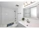 Bright bathroom featuring white subway tile shower, a large sink, and modern finishes at 7920 E Camelback Rd # 612, Scottsdale, AZ 85251