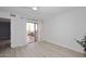 Bright bedroom featuring light wood floors and a balcony at 7920 E Camelback Rd # 612, Scottsdale, AZ 85251