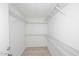 Walk-in closet featuring white wire shelving at 7920 E Camelback Rd # 612, Scottsdale, AZ 85251