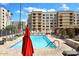 A refreshing outdoor pool is surrounded by lounge chairs for residents to relax and soak up the sun at 7920 E Camelback Rd # 612, Scottsdale, AZ 85251