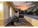 Inviting front porch with brick base, outdoor seating and charming decor; a delightful spot for relaxing and enjoying neighborhood views at 8021 N 16Th Dr, Phoenix, AZ 85021