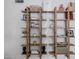 Stylish shelving displaying an array of decorative items, combining function and aesthetics to enhance the home's interior at 8021 N 16Th Dr, Phoenix, AZ 85021