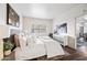 Inviting bedroom featuring a plush bed with decorative pillows and stylish furniture at 930 N Mesa Dr # 1079, Mesa, AZ 85201