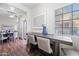 Cozy dining area with a modern wood table and seating with neutral decorations at 930 N Mesa Dr # 1079, Mesa, AZ 85201