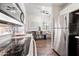 Modern kitchen featuring stainless steel appliances and an open floor plan at 930 N Mesa Dr # 1079, Mesa, AZ 85201