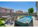 Entertainer's backyard with pool, patio furniture and barbecue area at 941 W Dexter Way, San Tan Valley, AZ 85143