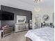 Primary bedroom showcasing modern decor, plush textiles, and contemporary lighting at 941 W Dexter Way, San Tan Valley, AZ 85143