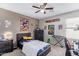 Comfortable bedroom featuring a black bed frame and carpet floors at 941 W Dexter Way, San Tan Valley, AZ 85143