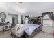 Stylish bedroom with chic decor, plush bedding, and contemporary lighting at 941 W Dexter Way, San Tan Valley, AZ 85143