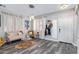 Inviting living room with wood flooring, neutral colors, stylish decor, and lots of natural light at 941 W Dexter Way, San Tan Valley, AZ 85143