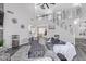 A luxurious living room with high ceilings, a staircase, and open doorway at 941 W Dexter Way, San Tan Valley, AZ 85143