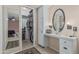 Walk-in closet with shelving and mirror in Primary bedroom at 9606 W Long Hills Dr, Sun City, AZ 85351
