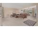 Spacious living area featuring plush carpeting and lots of natural light at 9606 W Long Hills Dr, Sun City, AZ 85351