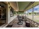 Enjoy the enclosed patio with a ceiling fan and neighborhood views at 9606 W Long Hills Dr, Sun City, AZ 85351