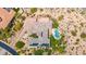 Aerial view of a stunning home with a pool and solar panels at 9936 E Winter Sun Dr, Scottsdale, AZ 85262