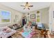 Cozy playroom featuring toys, natural light, and a ceiling fan at 9936 E Winter Sun Dr, Scottsdale, AZ 85262