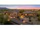 Stunning exterior elevation showcasing the home's architecture, desert landscaping, and inviting entryway at 9936 E Winter Sun Dr, Scottsdale, AZ 85262
