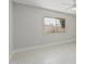 Bright bedroom with a window overlooking the outdoor landscape at 1019 W Mohawk Ln, Phoenix, AZ 85027