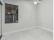 Small, unfurnished bedroom with a window view of the outdoors at 1019 W Mohawk Ln, Phoenix, AZ 85027