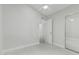 Neutral-toned bedroom with closet, interior doors and tile floors at 1019 W Mohawk Ln, Phoenix, AZ 85027