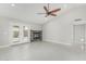 Bright living room features a fireplace and French doors to the outdoor space at 1019 W Mohawk Ln, Phoenix, AZ 85027