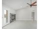 Bright open concept living room features tile flooring, a ceiling fan and fireplace at 1019 W Mohawk Ln, Phoenix, AZ 85027