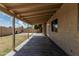 Covered patio offers a shady spot to enjoy the outdoors with views of the backyard at 1019 W Mohawk Ln, Phoenix, AZ 85027
