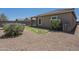 Backyard featuring desert landscaping and block wall at 11625 N 153Rd Dr, Surprise, AZ 85379