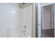 Bright bathroom features white tile in the shower and neutral wall paint at 11625 N 153Rd Dr, Surprise, AZ 85379