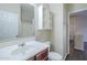Bathroom with white sink, toilet, vanity, and cabinet at 11625 N 153Rd Dr, Surprise, AZ 85379