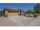 Charming single-story home with well-maintained landscaping and a two-car garage at 11625 N 153Rd Dr, Surprise, AZ 85379