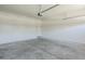 Spacious two car garage with high ceilings and painted walls at 11625 N 153Rd Dr, Surprise, AZ 85379