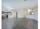 Open-concept layout featuring kitchen, living area, and wood flooring at 11625 N 153Rd Dr, Surprise, AZ 85379